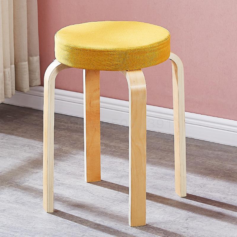 Tabouret scandinave avec assise ronde rembourrée en tissu et pieds en bois