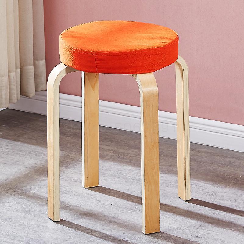 Tabouret scandinave avec assise ronde rembourrée en tissu et pieds en bois