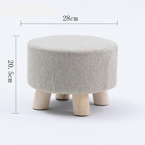 Tabouret scandinave bas avec assise ronde en tissus