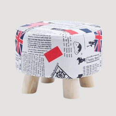 Tabouret scandinave bas avec assise ronde en tissu