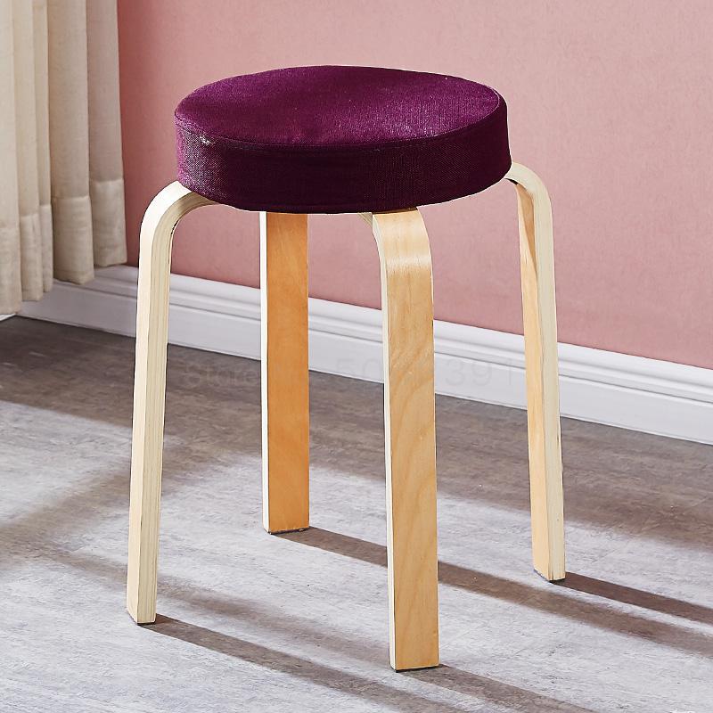 Tabouret scandinave avec assise ronde rembourrée en tissu et pieds en bois