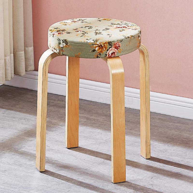 Tabouret scandinave avec assise ronde rembourrée en tissu et pieds en bois