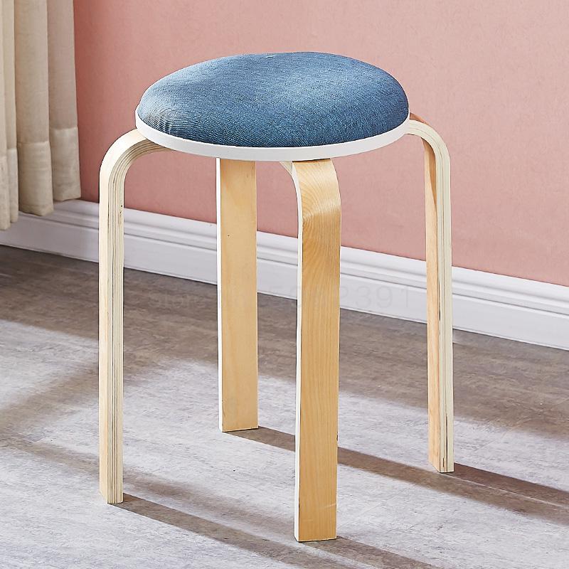 Tabouret scandinave avec assise ronde rembourrée en tissu et pieds en bois