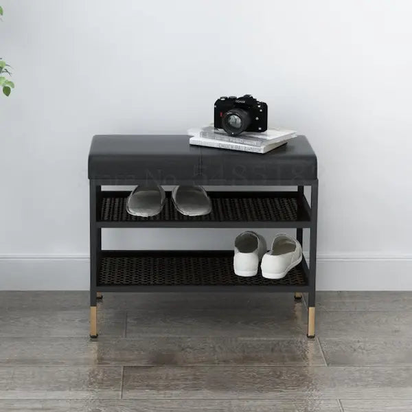 Banc de rangement design en métal noir et cuir