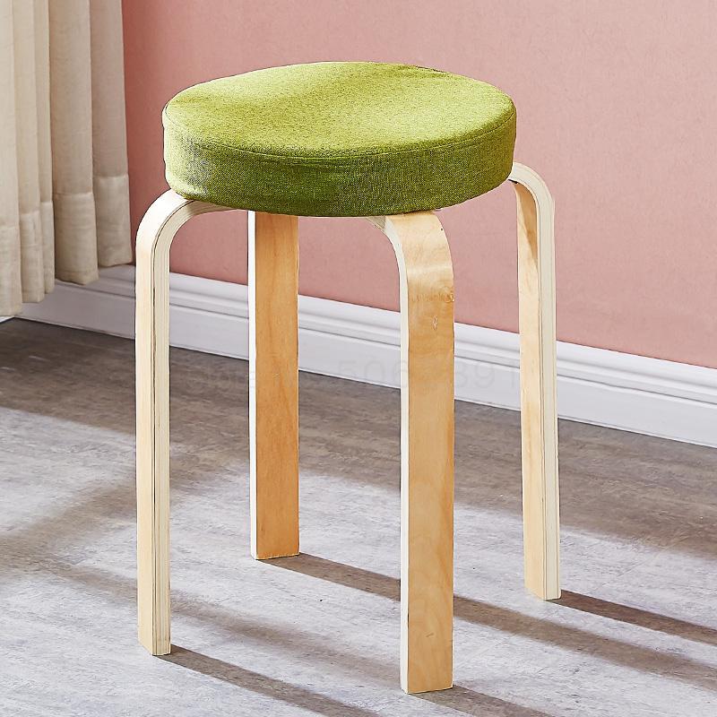 Tabouret scandinave avec assise ronde rembourrée en tissu et pieds en bois