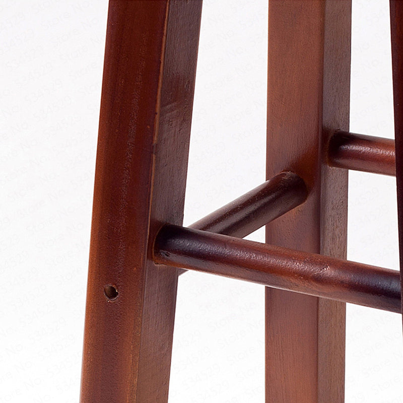 Tabouret de bar en bois massif vernis avec double repose pieds