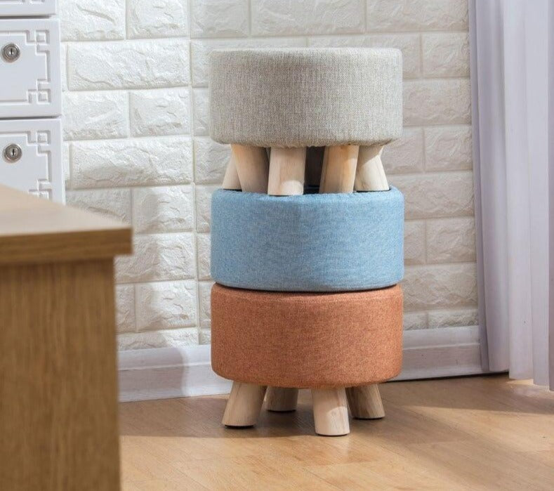 Tabouret scandinave bas avec assise ronde en tissus