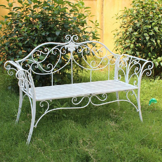 Banc industriel en fer blanc avec arabesques