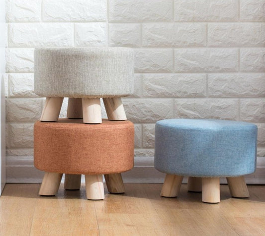 Tabouret scandinave bas avec assise ronde en tissus