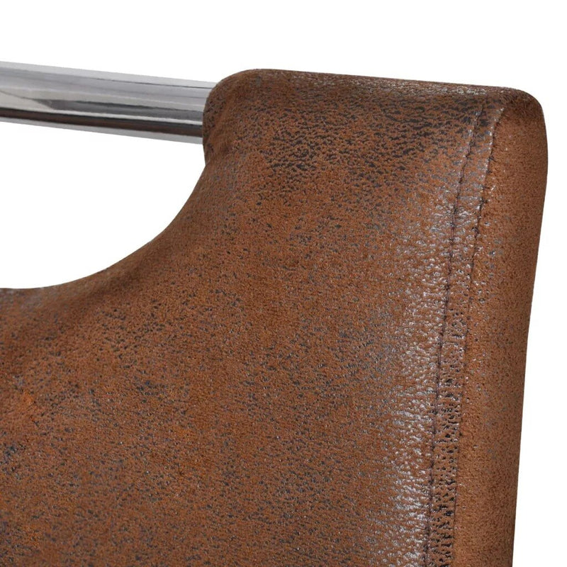 Chaise Design en cuir poncé marron et pieds en double arc de cercle en acier