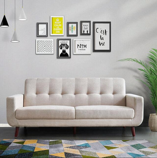 Canapé scandinave capitonné pieds marrons tissu crème