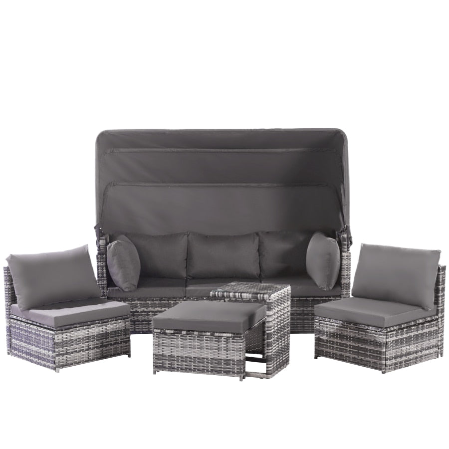 Canapé d'angle et salon de jardin gris avec capotte de protection
