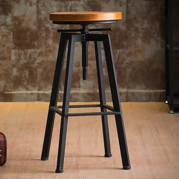 Tabouret industriel haut réglable en hauteur avec assise ronde et pieds en fer noir