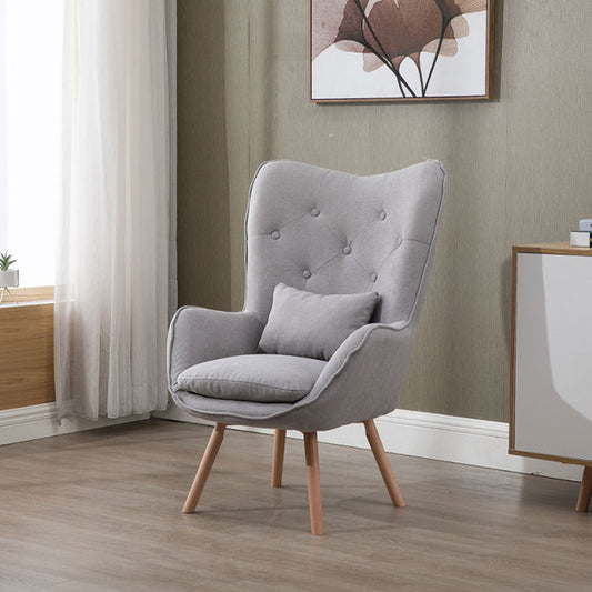 Fauteuil scandinave capitonné dossier large et accoudoirs inclinés