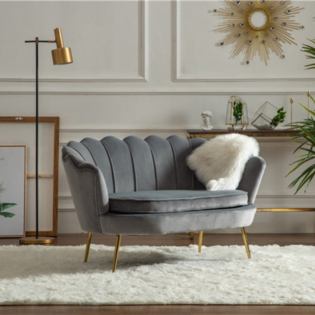 Fauteuil design à dossier fleur large en velours et métal doré