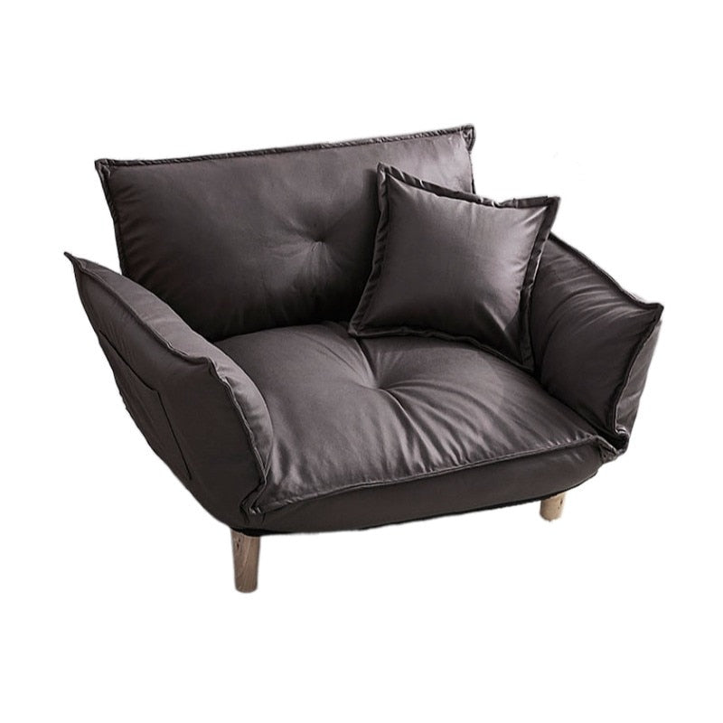 Fauteuil scandinave relax avec accoudoirs rabattables