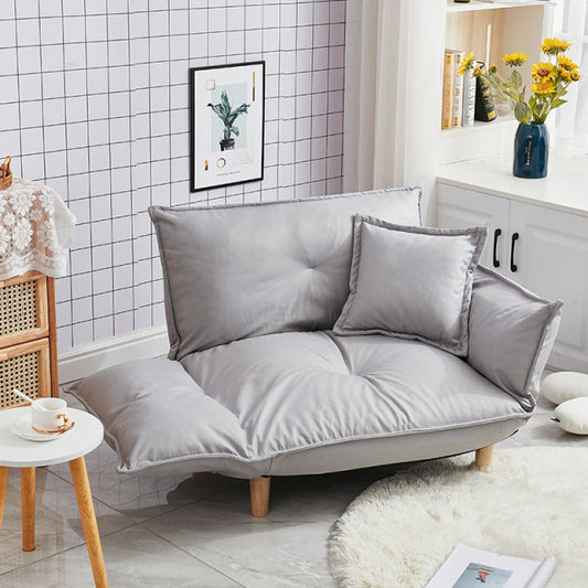 Fauteuil scandinave relax avec accoudoirs rabattables gris