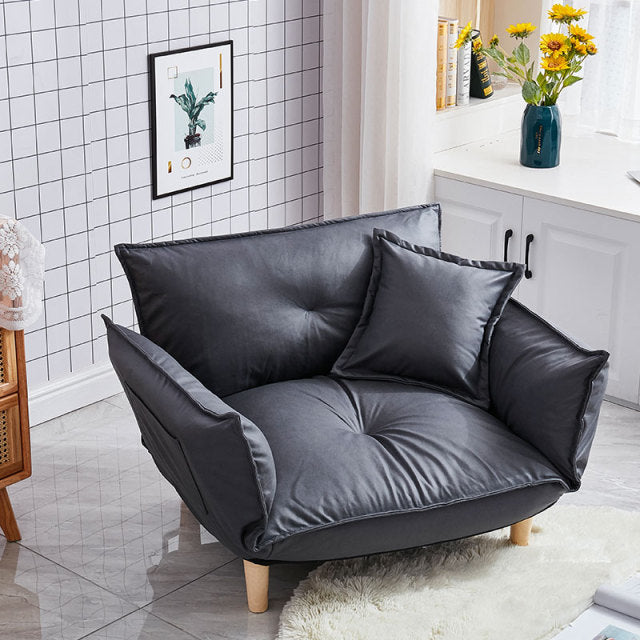 Fauteuil scandinave relax avec accoudoirs rabattables gris