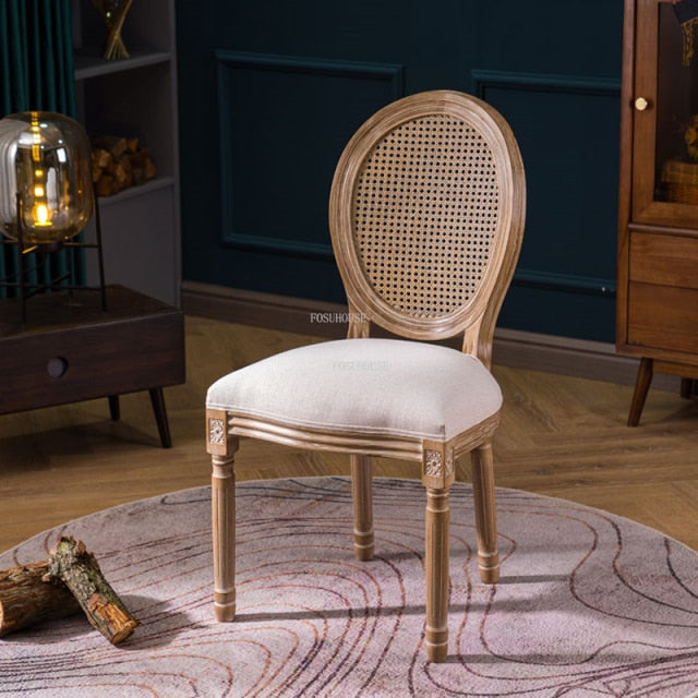 Chaise médaillon empereur en bois et rotin avec accoudoirs