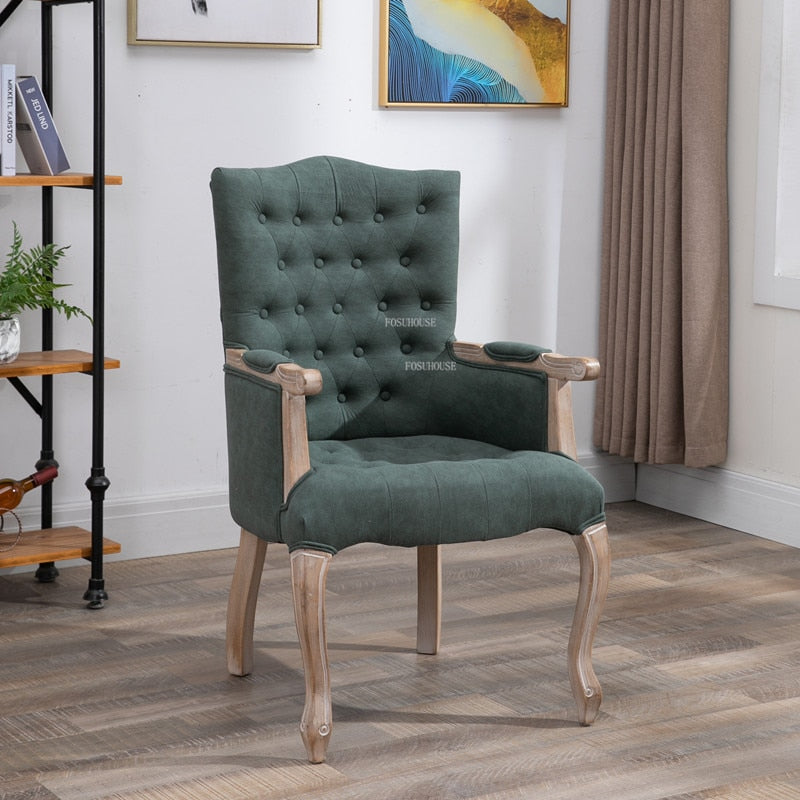 Fauteuil vintage capitonné avec armature bois