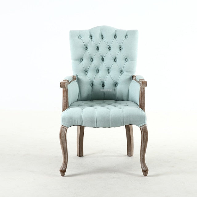 Fauteuil vintage capitonné avec armature bois