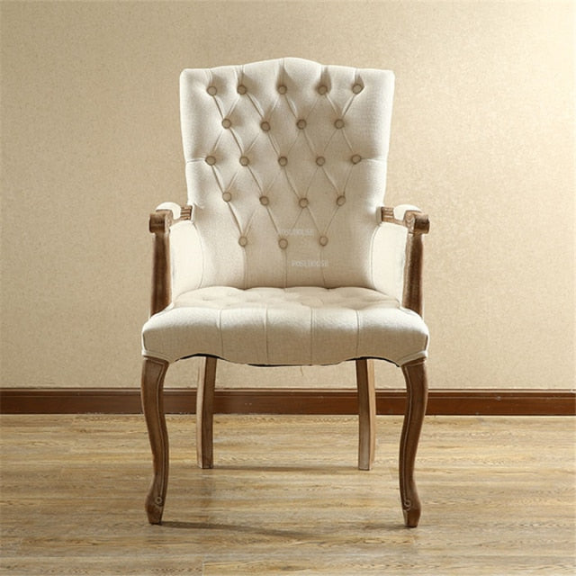 Fauteuil vintage capitonné avec armature bois