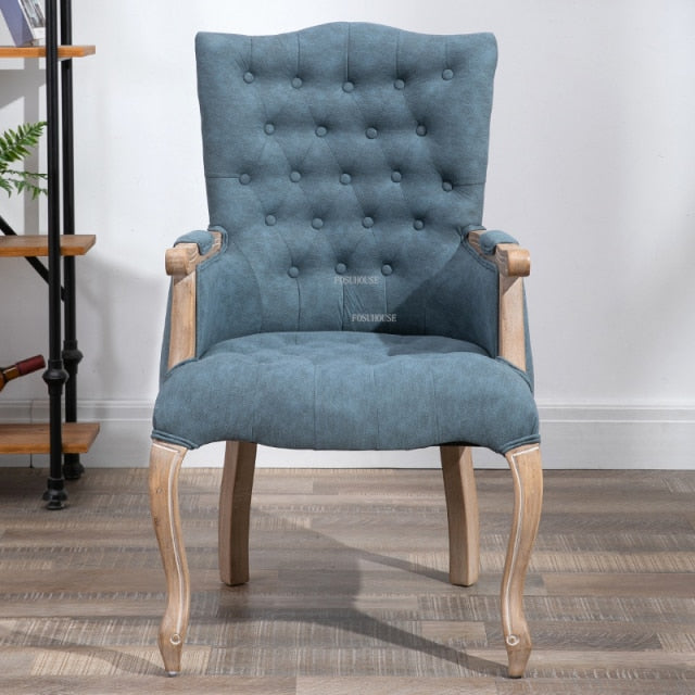 Fauteuil vintage capitonné avec armature bois