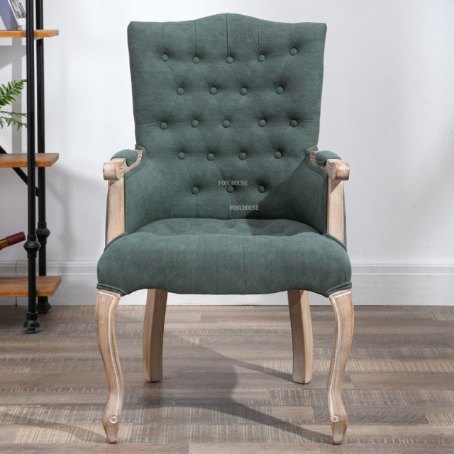 Fauteuil vintage capitonné avec armature bois