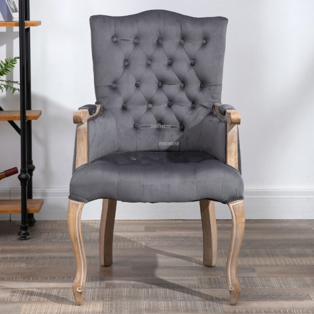 Fauteuil vintage capitonné avec armature bois