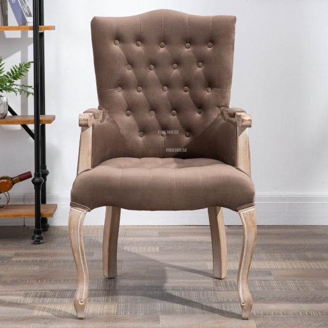 Fauteuil vintage capitonné avec armature bois