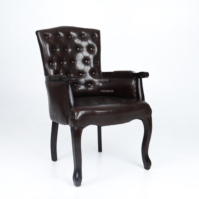 Fauteuil vintage capitonné avec armature bois
