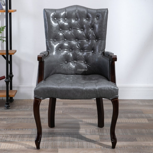Fauteuil vintage capitonné avec armature bois