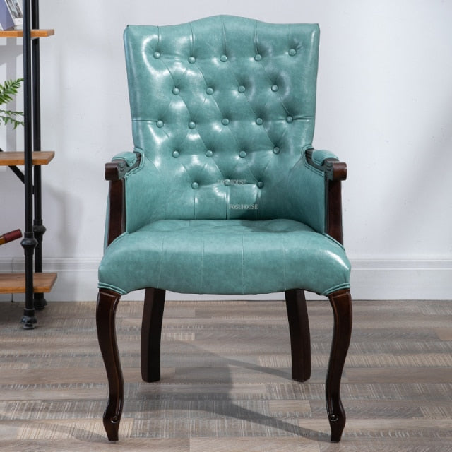 Fauteuil vintage capitonné avec armature bois