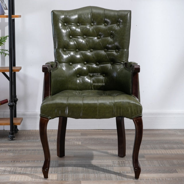 Fauteuil vintage capitonné avec armature bois
