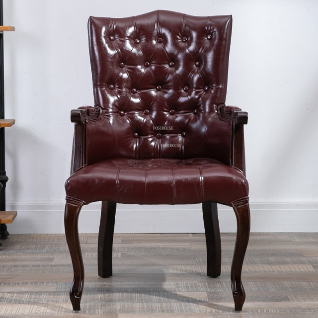 Fauteuil vintage capitonné avec armature bois