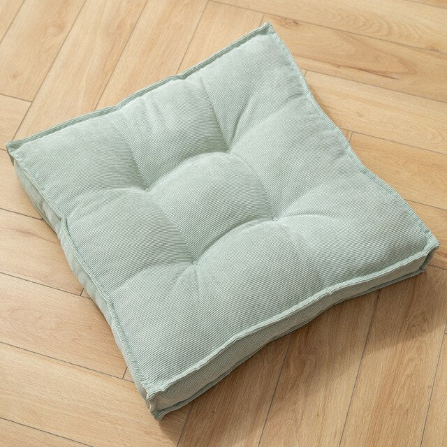 Coussin carré adaptable sol ou siège en tissu capitonné