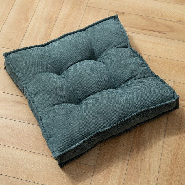 Coussin carré adaptable sol ou siège en tissu capitonné