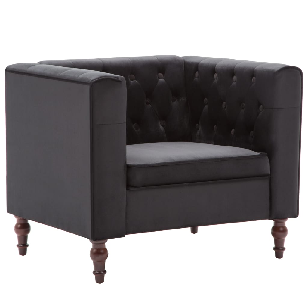 Fauteuil chesterfield en velours noir, vue de trois quarts