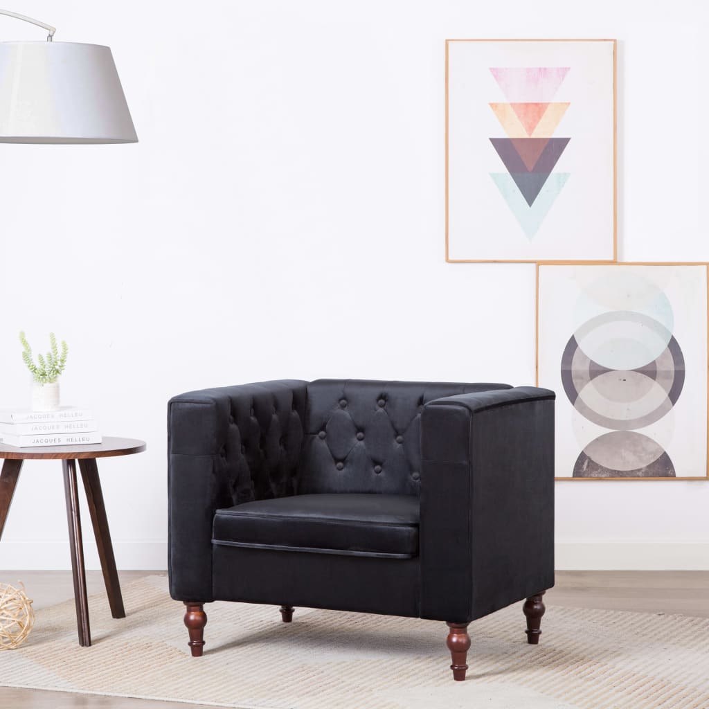 Fauteuil chesterfield velours noir en situation dans un salon