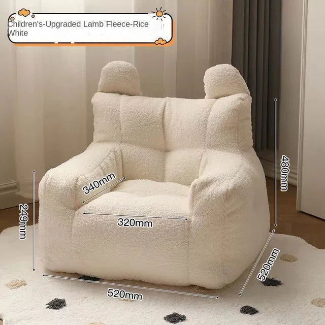 Fauteuil chambre bébé en tissu bouclette crème