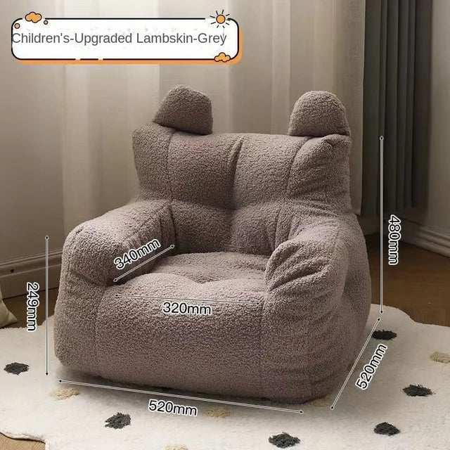 Fauteuil chambre bébé en tissu bouclette gris