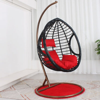 Chaise suspendue en rotin renforcé double coussin et socle en carbone