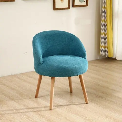 Chaise scandinave en velours et bois style fauteuil