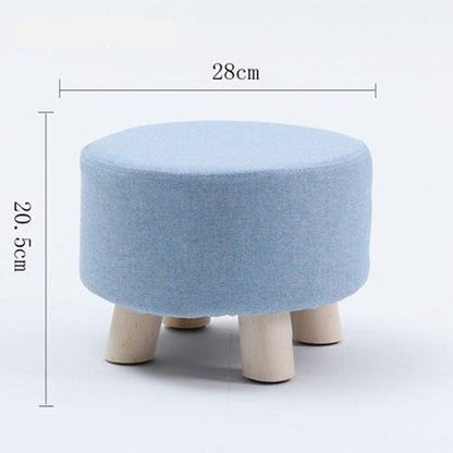 Tabouret scandinave bas avec assise ronde en tissus