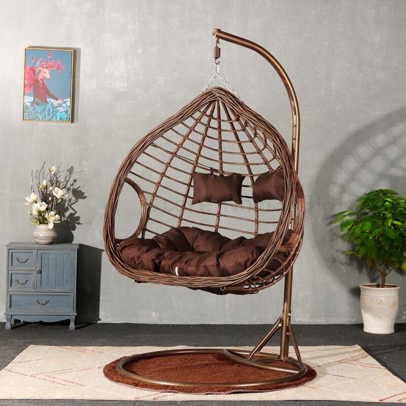 Chaise suspendue en rotin renforcé double coussin et socle en carbone