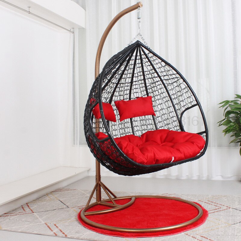 Chaise suspendue en rotin renforcé double coussin et socle en carbone