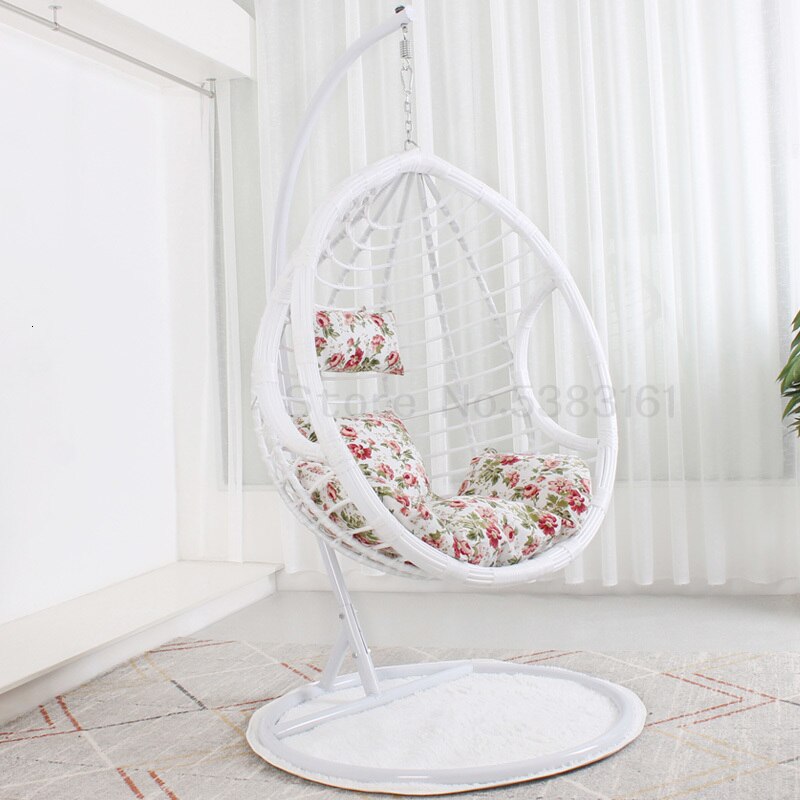 Chaise suspendue en rotin renforcé double coussin et socle en carbone