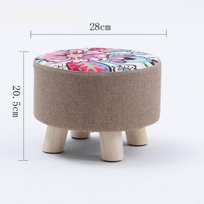 Tabouret scandinave bas avec assise ronde en tissu
