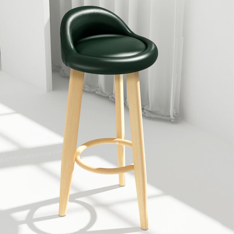 tabouret de bar de style scandinave avec assise matelassée en similicuir vert