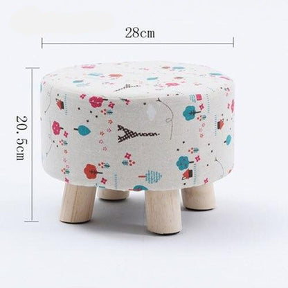 Tabouret scandinave bas avec assise ronde en tissus